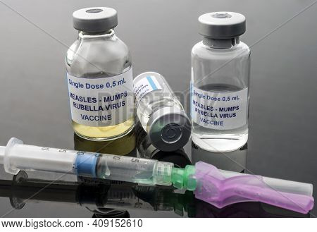 Different Vials Of Triple Viral Vaccine Of Measles, Rubella And Mumps, Known As Mmr, Conceptual Imag