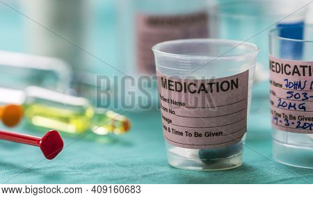 Diverse Medication In Glasses Monodose Along With Insulin Injectors In Hospital, Conceptual Image, H