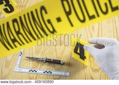 Scene Of Crime, Razor Spotted With Blood, Rule Of Ballistic Measurement, Conceptual Image, Horizonta