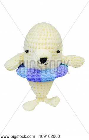 Small Lovely White Dophin Toy In Crochet Handmade On White Background And Clipping Path.