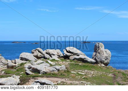 Beg-monom Coast And Sea In Plouguerneau During A Sunny Day