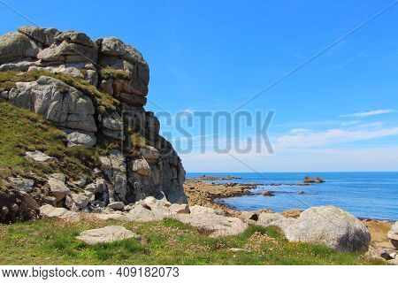 Beg-monom Coast And Sea In Plouguerneau During A Sunny Day