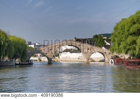 The Landmark Wulong Qiao Or Five Dragon Bridge Over The Grand Canal In The City Of Suzhou China On A
