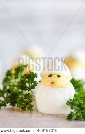 Deviled Eggs For Easter Decorated As Cute Little Chicks Hatching From Eggs With Carrot Beak And Seaw