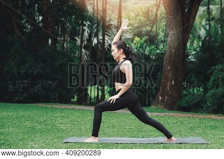 Asian Woman Practicing Yoga She To Start Preparing Of Prep Poses For Side Crane Pose For Parsva Baka