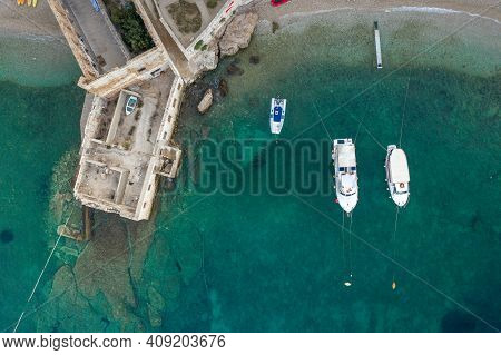 Aerial Overhead Drone View Of Yachts Near Gusarica Beach In Komiza On Vis Island In Coratia Before S