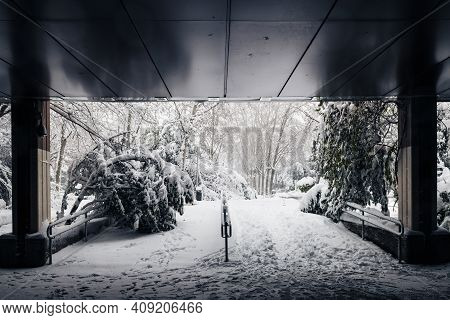 Gate To A Public Park In Central Madrid Covered In Snow During The Filomena Storm.