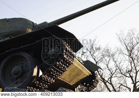 Monument With The Soviet T-34 Tank In Memory Of The Soldiers Of The Great Patriotic War. Monument To