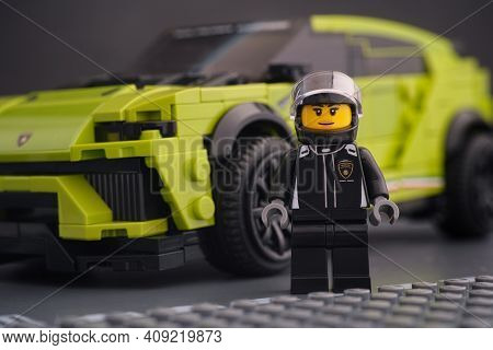 Tambov, Russian Federation - February 14, 2021 Lego Lamborghini Driver Minifigure Standing Near Her 