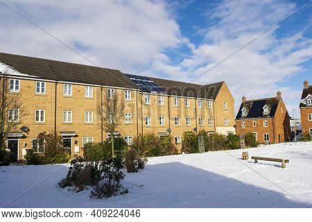Grantham, England - February 10, 2021. Cromford Court Residential Buildings On A Snowy Day With Sun 