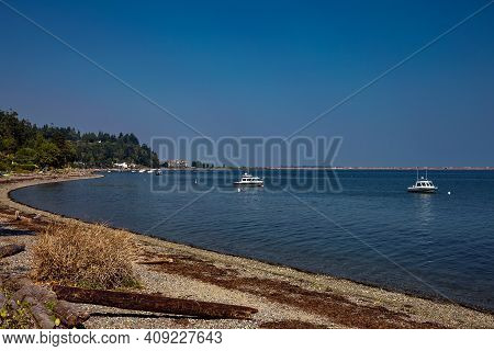 Tsawwassen Beach With High Tide,  Sea Beach, Hotel With Marina Yacht And Motorboats, Delta, British 