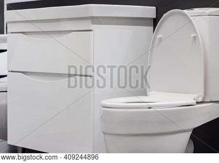 Photo Of Bathroom Table And Toilet Close-up.