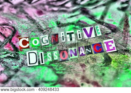 Partial Blurred Cut Out Colored Letters From Magazines And Compilation Of Cognitive Dissonance