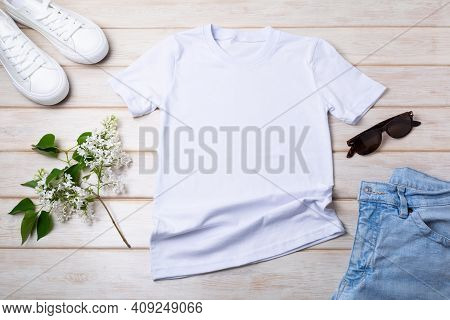 Women’s T-shirt Mockup With Lilac And White Sneakers