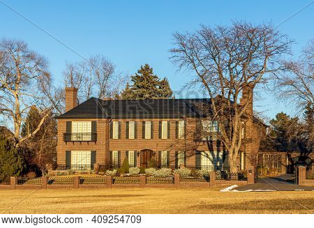 Denver, Colorado - February 19, 2021: Old Home With Beautiful Landscaping Near Cranmer Park In Denve
