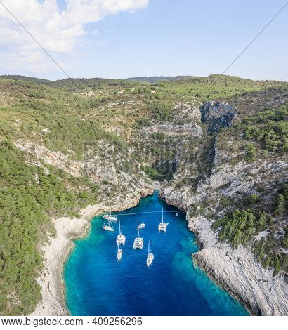 Aerial Drone Shot Of Iconic Stiniva Cove Beach Of Adriatic Sea On Vis Island In Croatia Summer