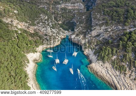Aerial Drone Shot Of Iconic Stiniva Cove Beach Of Adriatic Sea On Vis Island In Croatia Summer