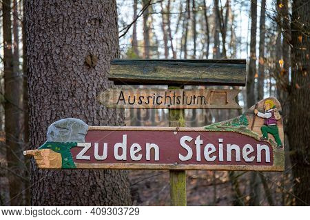 Rauen, Brandenburg, Germany - February 21, 2021 Sign In The Forest - Shows The Direction To Margrafe