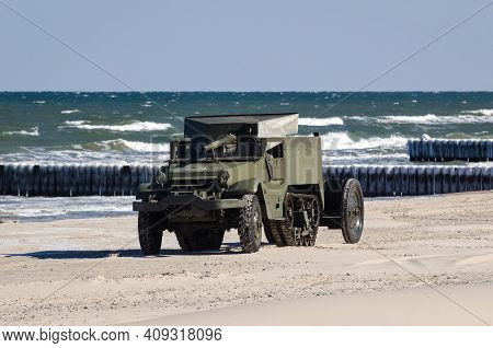 Half Track Transporter - A Historic Military Vehicle Of The 1st Polish Army On A Sea Beach
