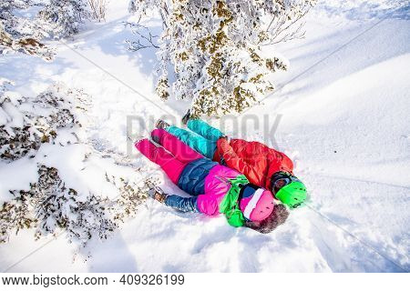 Couple Happy Lover Having Fun In Winter Snow Forest. Snowbarders And Skiers Team Friendship