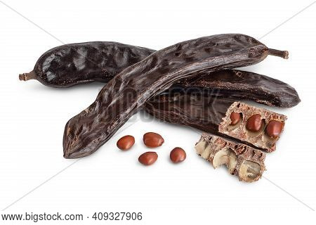 Ripe Carob Pods And Bean Isolated On White Background With Clipping Path And Full Depth Of Field