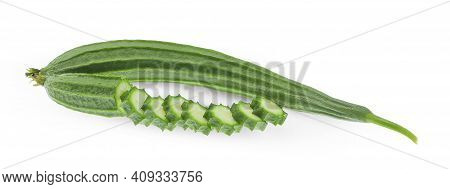 Whole And Slices Of  Luffa Acutangula,angled Loofah  Isolated On White Background