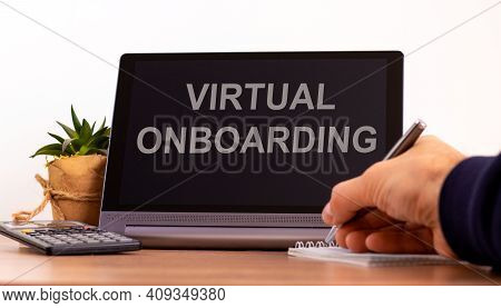 Virtual Onboarding Symbol. Tablet With Words Virtual Onboarding. Online Business And Onboarding Duri