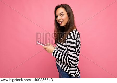 Side Profile Photo Of Amiling Happy Beautiful Young Brunette Woman Using Mobile Phone Communicating 