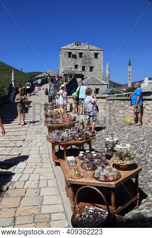 Mostar, Bosnia And Herzegovina - June 29, 2019: People Visit The Old Town Of Mostar. The Area Surrou