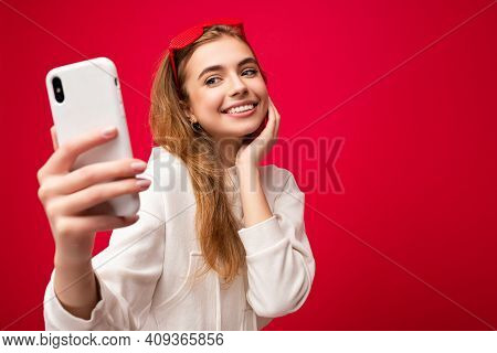 Closeup Portrait Of Sexy Attractive Positive Smiling Young Blonde Woman Wearing Stylish White Hoodie