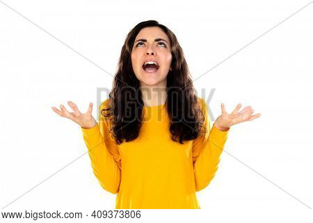 Adorable teenage girl with yellow sweater isolated on a white background