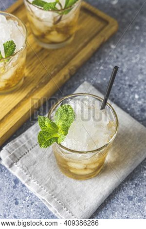 Classic Kentucky Derby Cocktail The Mint Julep Isolated On Light Gray Table Surface. Close Up, Shall