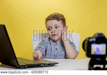 Child Blogger Videotapes His Vlog At Home. Boy Recording His Video Blog. Little Vlogger Makes Online