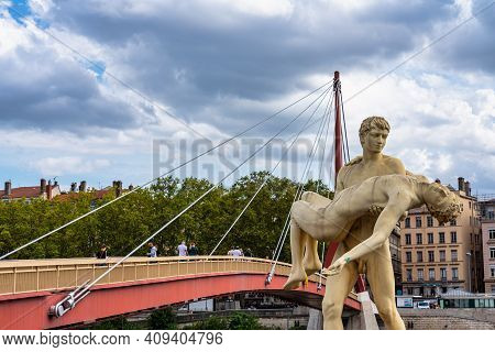 Lyon, France - Sep 28, 2020: Marble Statue Of 2 Men Called The Weight Of Oneself By Scandinavian Duo
