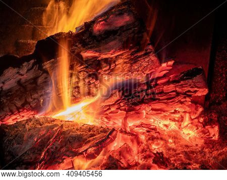 Burning Billets In Fireplace As Abstract Background