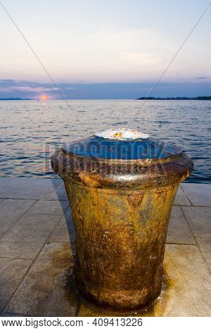 Old Ship Bollard At The Beach Of Zadar City In Croatia