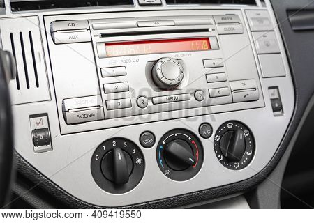 Novosibirsk, Russia - February 18 2021: Ford Kuga, A Close Up On A Black Panel With Radio,  Player A