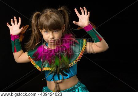 Girl Growling Like Animal, Making Cat Claws Gesture. Portrait Of Beautiful Preteen Girl Dressed Ethn