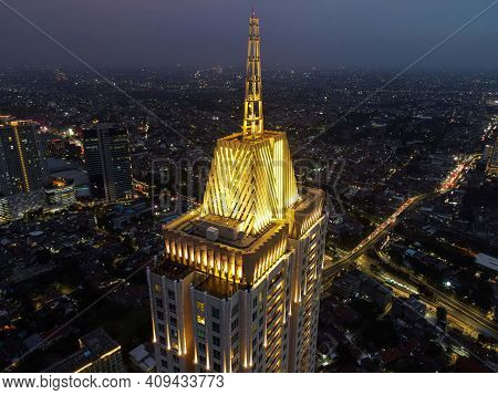 Pakubuwono Skyline Aerial Drone View From Above At Night, Jakarta Downtown Skyscrapers Cityscape And