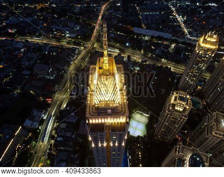 Pakubuwono Skyline Aerial Drone View From Above At Night, Jakarta Downtown Skyscrapers Cityscape And