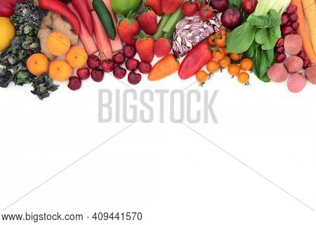 Healthy food collection for vegan and vegetarian diet with health foods high in antioxidants that neutralise free radicals, anthocyanins, lycopenes, fibre, vitamins and minerals. Border on white. 