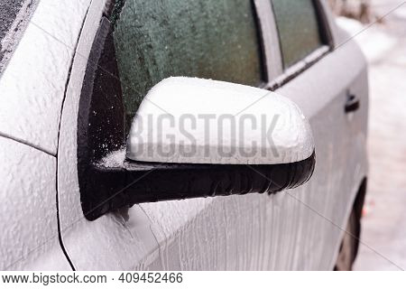 A Frozen Car Covered With Ice. How To De-ice The Frozen Car, Open A Frozen Shut Car Doors And Avoid 