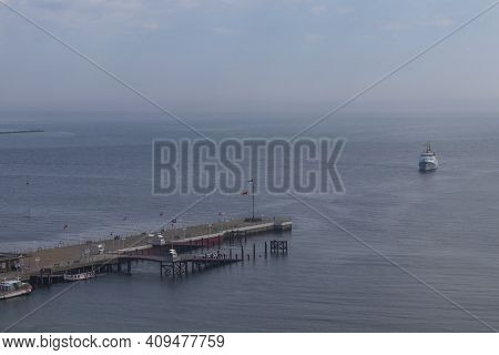 Houses And Alleys On The Island Of Helgoland With A View Of The Landscape And The Background Of The 
