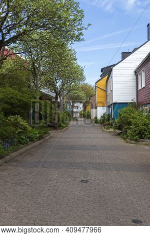 Houses And Alleys On The Island Of Helgoland With A View Of The Landscape And The Background Of The 