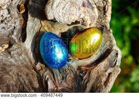 Cholate Eggs With Colored Paper For Easter Festivity