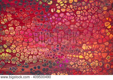 Colorful Abstract Acrylic Painting In Red And Yellow. Free Flowing Cells. Pouring.