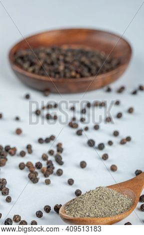A Wooden Plate Of Dried Pepper And Wooden Spoon