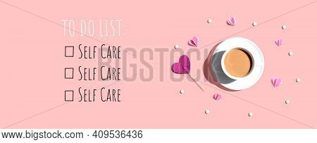Self Care - To Do List With A Cup Of Coffee And Paper Hearts - Flat Lay