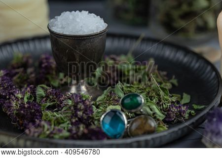 Magic Altar With Mystical Herbs, Salt, Candles And Crystals. Witch Sanctuary Sacred Esoteric Concept