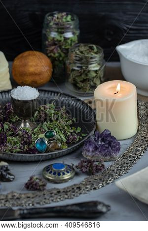 Magic Altar With Mystical Herbs, Salt, Candles And Crystals. Witch Sanctuary Sacred Esoteric Concept